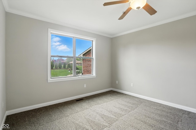 1127 Kay Dr, Greenwood, IN 46142 - empty room featuring ornamental molding, carpet flooring, and ceiling fan