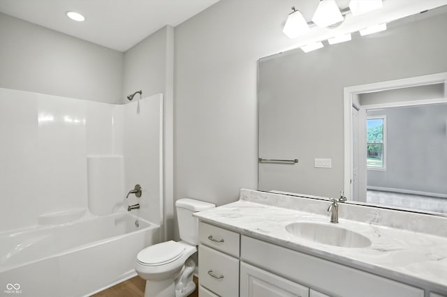 1127 Kay Dr, Greenwood, IN 46142 - bathroom featuring vanity, shower / bathtub combination, and wood finished floors
