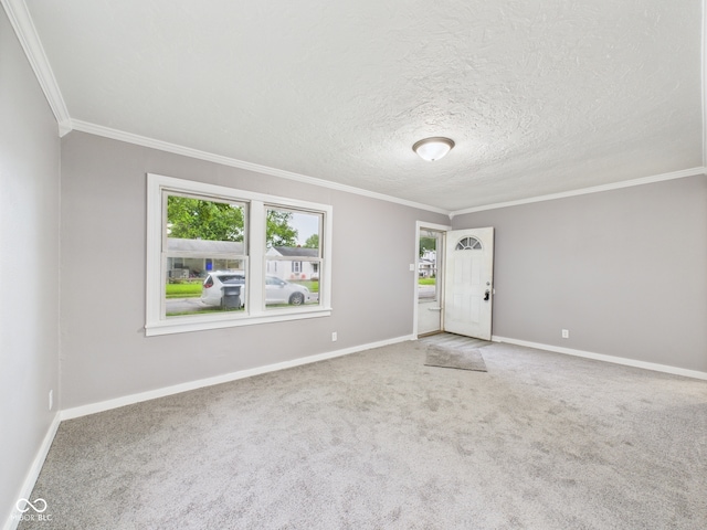 602 W 34th St, Anderson, IN 46013 - carpeted foyer featuring ornamental molding and a textured ceiling