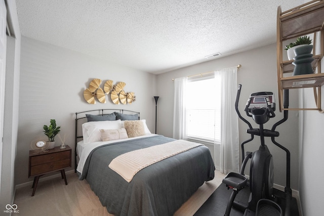 14459 Forsythia Ln, Fishers, IN 46038 - bedroom with light carpet and a textured ceiling