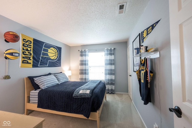14459 Forsythia Ln, Fishers, IN 46038 - carpeted bedroom featuring a textured ceiling and baseboards
