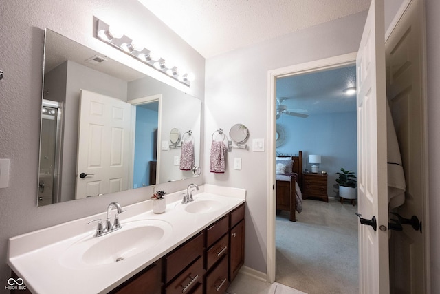 14459 Forsythia Ln, Fishers, IN 46038 - ensuite bathroom featuring double vanity and ceiling fan