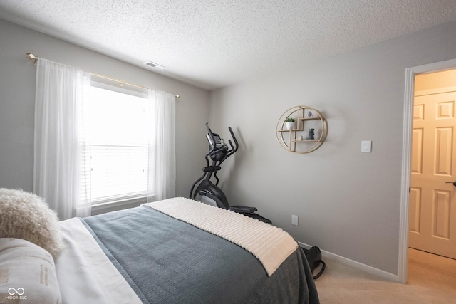 14459 Forsythia Ln, Fishers, IN 46038 - bedroom with light carpet and a textured ceiling