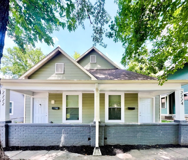 2222 E 12th St, Indianapolis, IN 46201 - view of front of home featuring covered porch