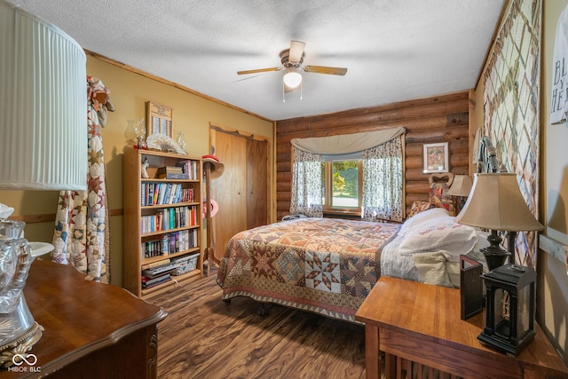 3370 E State Road 160, Salem, IN 47167 - bedroom featuring rustic walls, wood finished floors, a textured ceiling, and ceiling fan