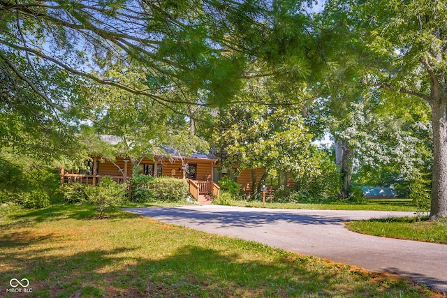 3370 E State Road 160, Salem, IN 47167 - log home with covered porch and a front lawn