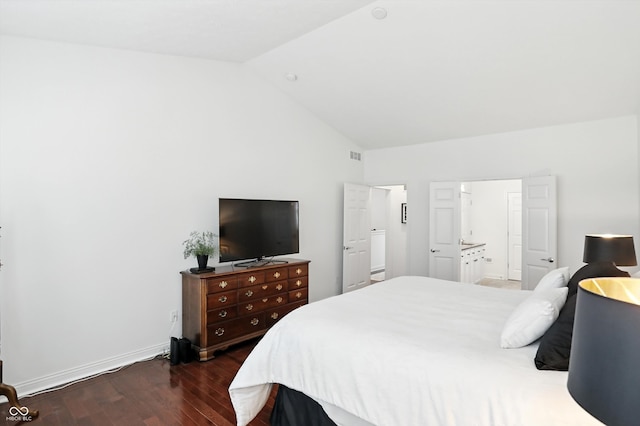 6570 Freemont Ln, Carmel, IN 46033 - bedroom with dark wood-style floors and vaulted ceiling