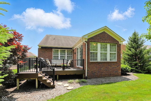 6570 Freemont Ln, Carmel, IN 46033 - back of property with brick siding, a wooden deck, stairway, a yard, and a shingled roof