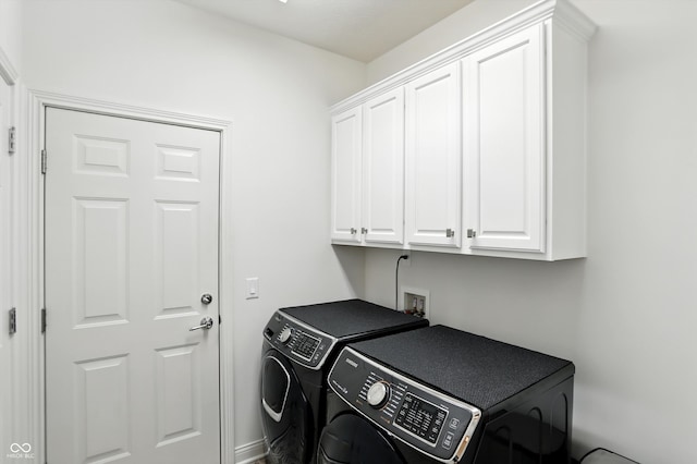 6570 Freemont Ln, Carmel, IN 46033 - laundry room with cabinet space and independent washer and dryer