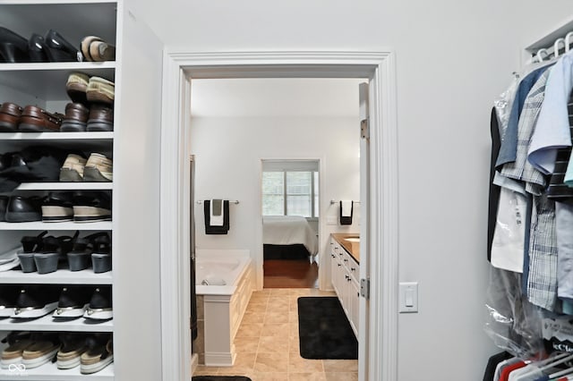 6570 Freemont Ln, Carmel, IN 46033 - spacious closet with light tile patterned flooring