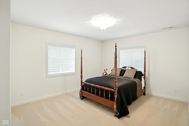 6570 Freemont Ln, Carmel, IN 46033 - bedroom featuring carpet flooring and multiple windows
