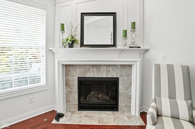 6570 Freemont Ln, Carmel, IN 46033 - detailed view of a tile fireplace and wood finished floors