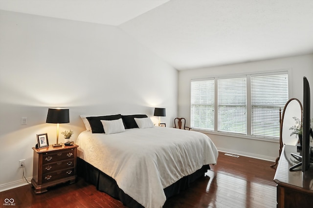 6570 Freemont Ln, Carmel, IN 46033 - bedroom featuring lofted ceiling and dark wood finished floors