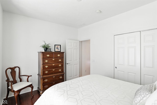 6570 Freemont Ln, Carmel, IN 46033 - bedroom featuring dark wood-style flooring and a closet