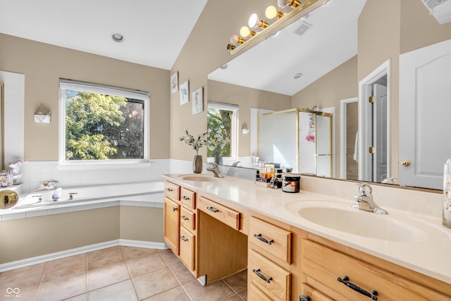 6374 Timberbluff Cir, Avon, IN 46123 - bathroom featuring double vanity, a shower stall, plenty of natural light, a bath, and lofted ceiling