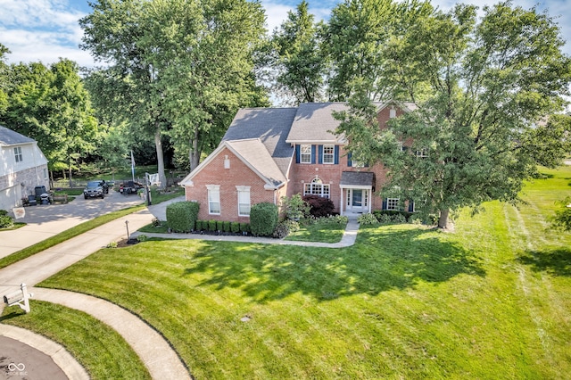 6374 Timberbluff Cir, Avon, IN 46123 - view of front facade with brick siding and a front lawn