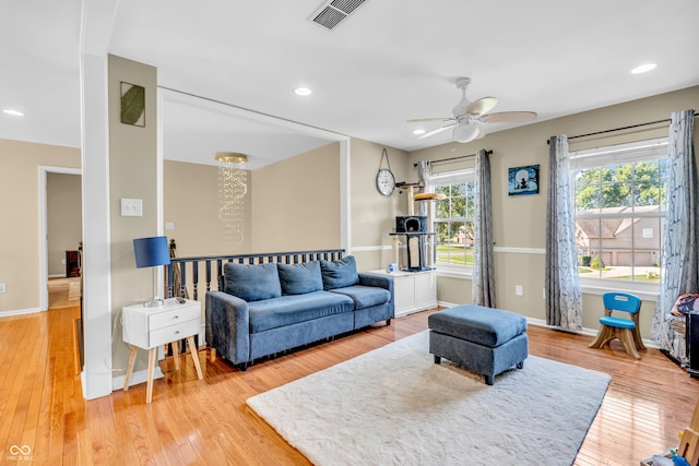 6374 Timberbluff Cir, Avon, IN 46123 - living room featuring light wood-type flooring, a ceiling fan, and recessed lighting