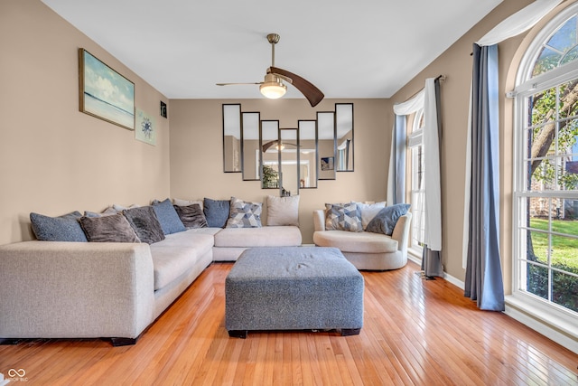 6374 Timberbluff Cir, Avon, IN 46123 - living room featuring plenty of natural light, ceiling fan, and light wood-style floors