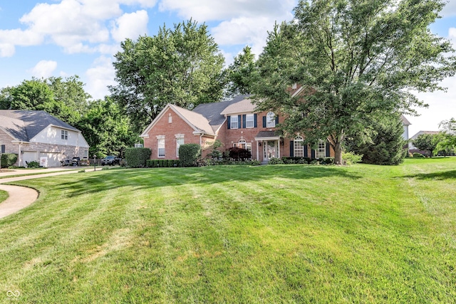 6374 Timberbluff Cir, Avon, IN 46123 - view of front facade with brick siding and a front lawn