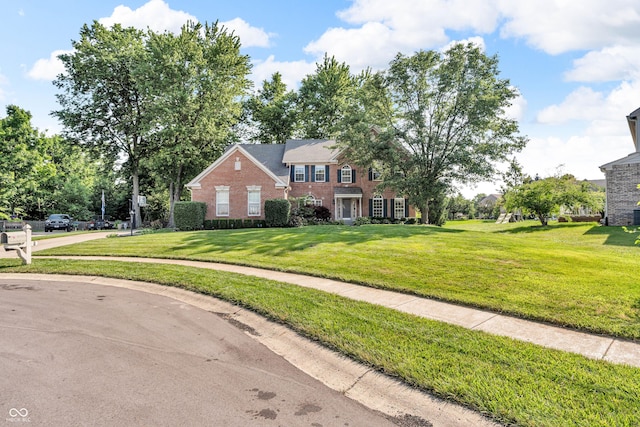 6374 Timberbluff Cir, Avon, IN 46123 - view of front of house with a front yard and brick siding