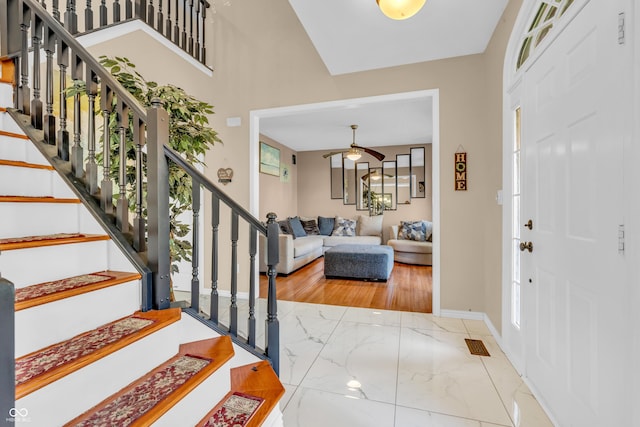 6374 Timberbluff Cir, Avon, IN 46123 - entryway featuring marble tiled flooring and stairway