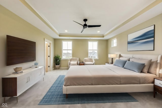 7604 Brownstone Ct, Greenfield, IN 46140 - bedroom featuring light carpet, a tray ceiling, ceiling fan, and recessed lighting