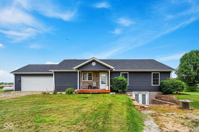8638 W Flatwoods Rd, Gosport, IN 47433 - single story home with driveway, a front lawn, an attached garage, roof with shingles, and a porch