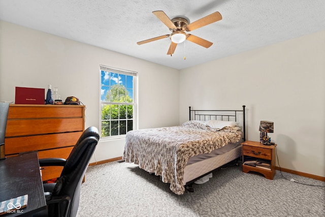8638 W Flatwoods Rd, Gosport, IN 47433 - bedroom with carpet flooring, an office area, a ceiling fan, and a textured ceiling