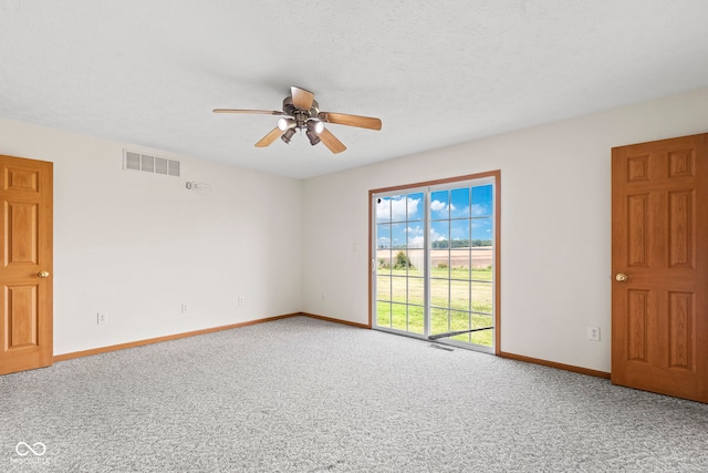 8638 W Flatwoods Rd, Gosport, IN 47433 - empty room featuring carpet and a ceiling fan