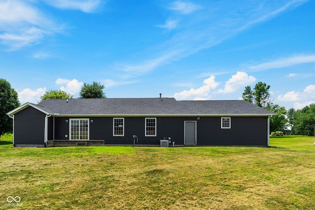 8638 W Flatwoods Rd, Gosport, IN 47433 - back of house with a lawn and roof with shingles