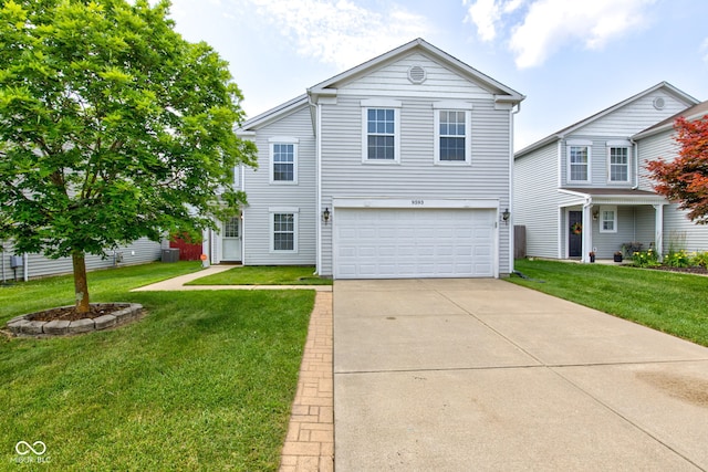 9593 W Constellation Dr, Pendleton, IN 46064 - traditional-style house featuring a garage, a front yard, and driveway