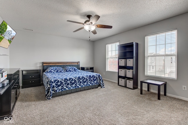 9593 W Constellation Dr, Pendleton, IN 46064 - carpeted bedroom with a textured ceiling and a ceiling fan
