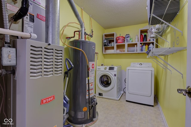 9593 W Constellation Dr, Pendleton, IN 46064 - laundry room featuring water heater, heating unit, separate washer and dryer, and a textured ceiling