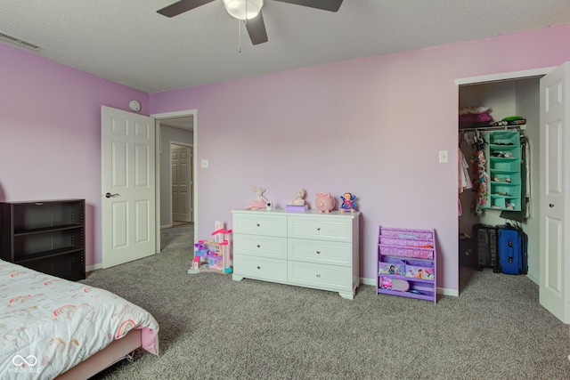 9593 W Constellation Dr, Pendleton, IN 46064 - carpeted bedroom featuring ceiling fan, a closet, and a walk in closet