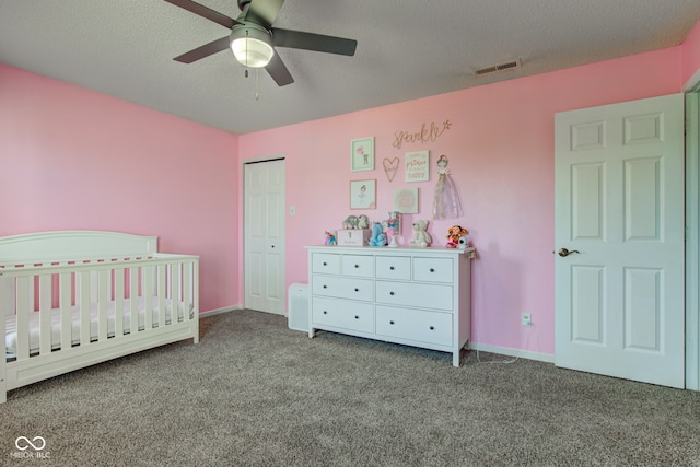 9593 W Constellation Dr, Pendleton, IN 46064 - carpeted bedroom featuring a crib, ceiling fan, and a closet