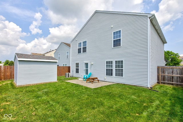 9593 W Constellation Dr, Pendleton, IN 46064 - rear view of property with a storage unit, a fenced backyard, and a patio