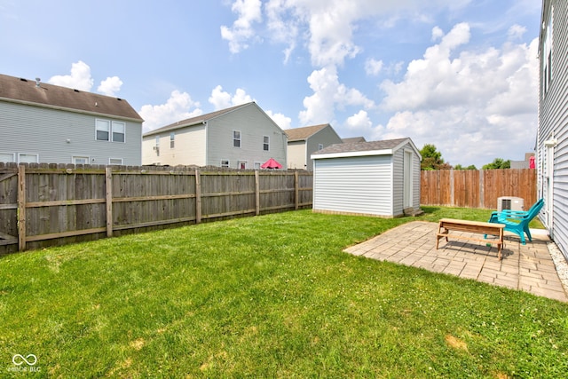 9593 W Constellation Dr, Pendleton, IN 46064 - fenced backyard with a storage unit and a patio area