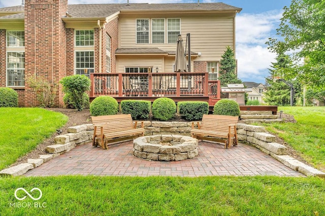 5865 Osage Dr, Carmel, IN 46033 - rear view of property featuring an outdoor fire pit, a patio, a wooden deck, and brick siding