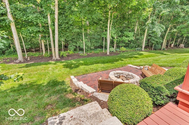 5865 Osage Dr, Carmel, IN 46033 - view of grassy yard with a fire pit