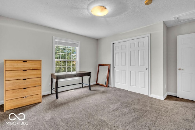 5865 Osage Dr, Carmel, IN 46033 - carpeted bedroom featuring a closet and a textured ceiling