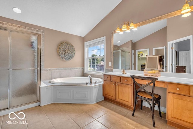 5865 Osage Dr, Carmel, IN 46033 - bathroom featuring vaulted ceiling, a shower stall, vanity, a bath, and tile patterned flooring