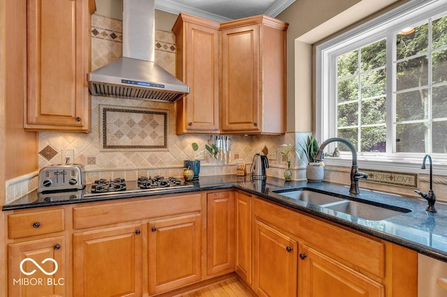 5865 Osage Dr, Carmel, IN 46033 - kitchen featuring wall chimney exhaust hood, gas cooktop, dark stone countertops, backsplash, and ornamental molding