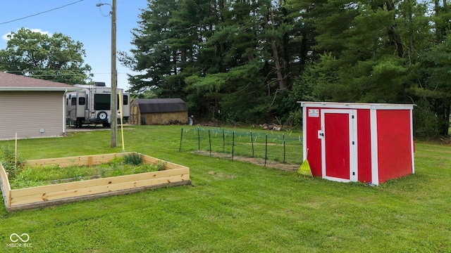 5110 W County Road 400 N, Scipio, IN 47273 - view of yard with a storage unit and a garden