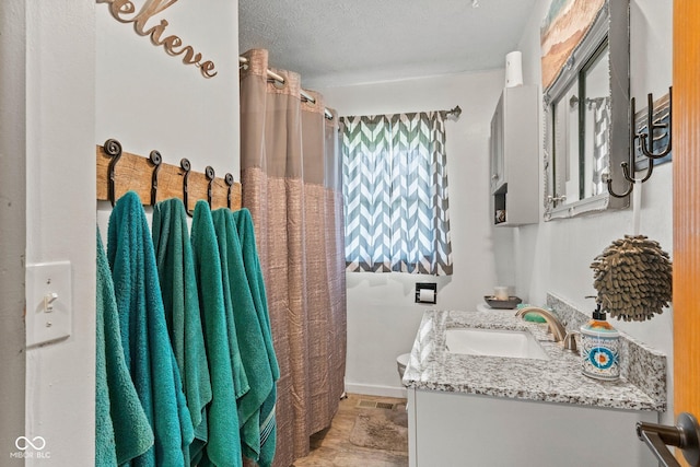 5110 W County Road 400 N, Scipio, IN 47273 - full bathroom featuring vanity, stone finish floors, a textured ceiling, and curtained shower
