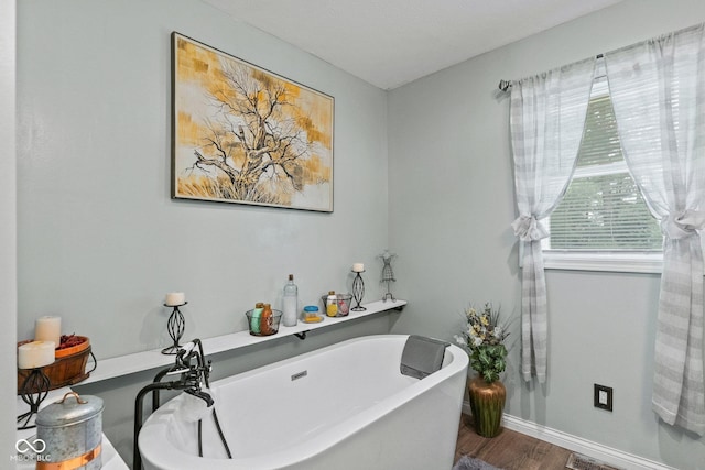5110 W County Road 400 N, Scipio, IN 47273 - bathroom with a freestanding bath and wood finished floors