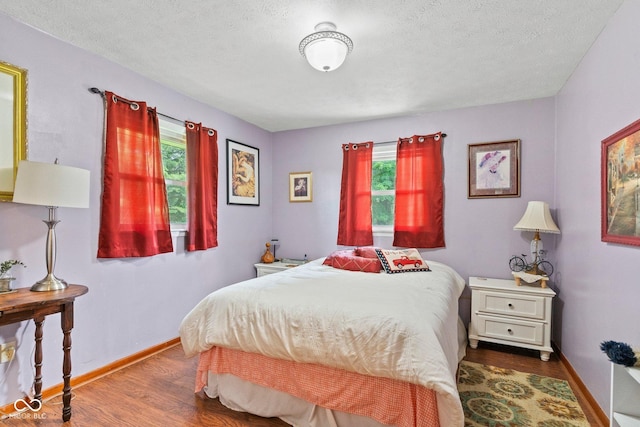 5110 W County Road 400 N, Scipio, IN 47273 - bedroom with wood finished floors and a textured ceiling