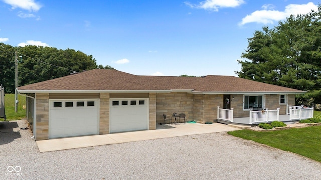 5110 W County Road 400 N, Scipio, IN 47273 - single story home with driveway, a garage, roof with shingles, and covered porch