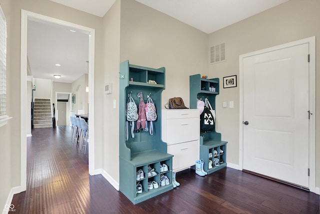 16711 Meadow Wood Dr, Noblesville, IN 46062 - mudroom with dark wood finished floors and baseboards