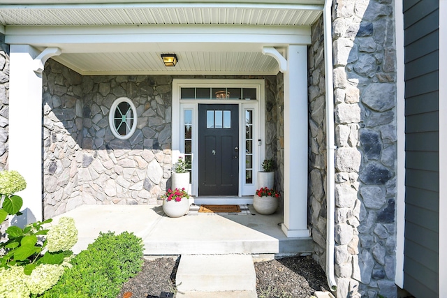 16711 Meadow Wood Dr, Noblesville, IN 46062 - doorway to property featuring stone siding and a porch