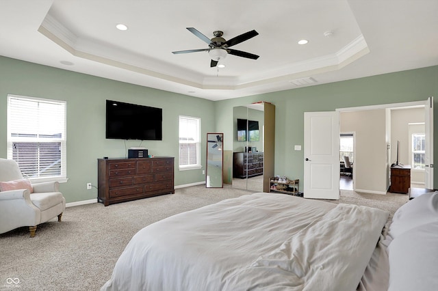 16711 Meadow Wood Dr, Noblesville, IN 46062 - bedroom featuring a raised ceiling, crown molding, light colored carpet, recessed lighting, and ceiling fan
